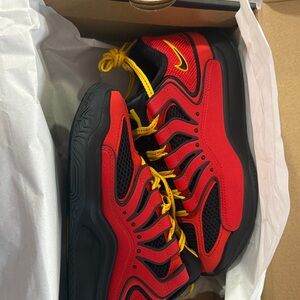 Nike Kids Red and Black Sneakers with Yellow Accents